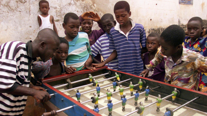 NIgerian kids play foozball