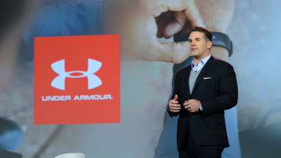 In this photo taken by Feature Photo Service for IBM: At CES, IBM Chairman and CEO Ginni Rometty, and Kevin Plank, Founder and CEO, Under Armour, announced a new "cognitive coaching" system, powered by Watson, that will transform personal health and fitness, Weds., January 6, 2016 in Las Vegas, Nev. The system will serve as a personal health consultant, fitness trainer and assistant by providing athletes with coaching around sleep, fitness, activity and nutrition. It will initially be available within UA Record (TM) available now on the App Store. (Alan Rosenberg/Feature Photo Service for IBM)