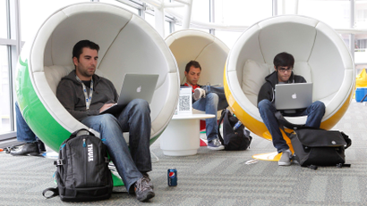 Matthias Klabbenbach (L), of eBay, Massimo Paladin (2nd L), of Cern, and Shahruz Shaukat, of University of California at Davis, take a break between events at the Google I/O Developers Conference in the Moscone Center in San Francisco.