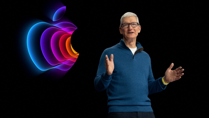 Apple CEO Tim Cook onstage with Apple logo in background