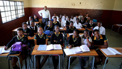 outh Africa’s education department reduces the pass mark for mathematics to 20% in public schools