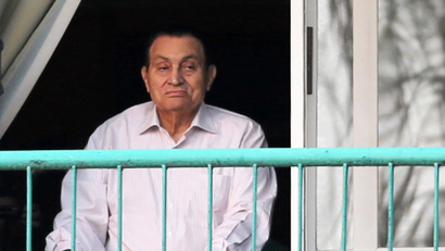 Ousted Egyptian president Hosni Mubarak looks towards his supporters outside the area where he is hospitalized during the celebrations of the 43rd anniversary of the 1973 Arab-Israeli war, at Maadi military hospital on the outskirts of Cairo, Egypt October 6, 2016.