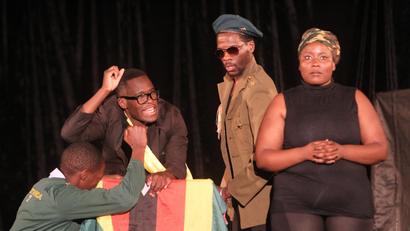 Zimbabwean actors are seen during a comedy scene from a show called State of The Nation, Thursday, Sept,15, 2016. Zimbabwe's comedy scene is booming as the country's economy is tanking, and police are cracking down on growing anti government protests. At the recent State of the Nation show, even 92 year President Robert Mugabe widely accused of muzzling free speech was targeted, Insulting the president attracts a year jail term in this Southern African nation. Nonetheless, the comedians carry on.