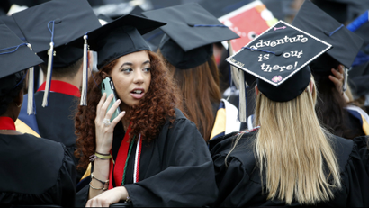 Graduates are seated during George Washington University's 2015 commencement exercises in Washington, DC.