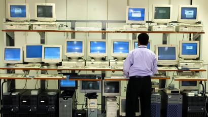 An engineer works in the server room at Infosys Technologies campus at Electronics City in Bangalore..