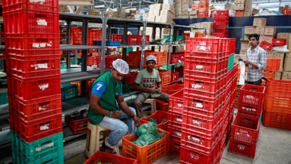 Workers at a BigBasket warehouse.