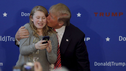donald trump kisses young supporter at rally