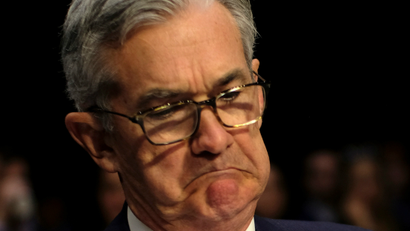 Fed chair Jerome Powell making a quizzical face.