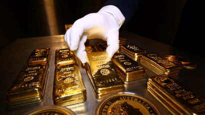 Gold bars and coins in the safe deposit boxes room of the Pro Aurum gold house in Munich