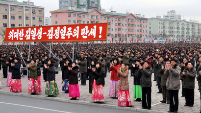 People rally to hail the completion of the state nuclear force, the cause of building a rocket power under the guidance of the Workers' Party of Korea, in this in this undated photo released by North Korea's Korean Central News Agency (KCNA) on December 6, 2017.