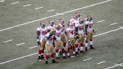 Members of the San Francisco 49ers wait for a kick off during the third quarter of an NFL football game against the St. Louis Rams Sunday, Jan. 1, 2012, in St. Louis.