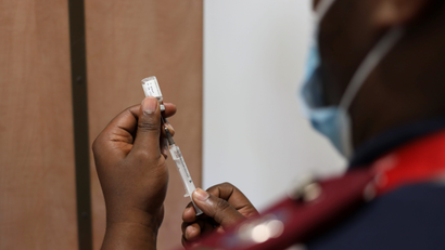A nurse prepares a dose of a Covid-19 vaccine as the new Omicron variant spreads, in Dutywa, in the Eastern Cape province, South Africa November 29, 2021.