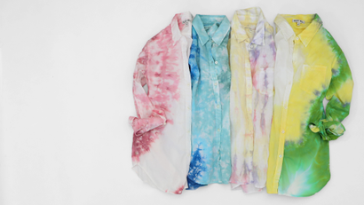 Alex Mill tie-dyed button-down shirts in bright pastel colors.