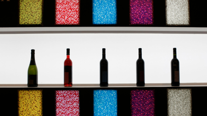 Wine bottles are displayed at Alimentaria trade show in Barcelona