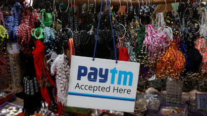 An advertisement of Paytm, a digital wallet company, is pictured at a road side stall in Kolkata