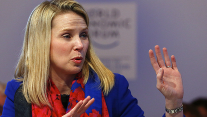 Yahoo CEO Marissa Mayer gestures before the session "In Tech We Trust" in the Swiss mountain resort of Davos January 22, 2015. More than 1,500 business leaders and 40 heads of state or government attend the Jan. 21-24 meeting of the World Economic Forum (WEF) to network and discuss big themes, from the price of oil to the future of the Internet. This year they are meeting in the midst of upheaval, with security forces on heightened alert after attacks in Paris, the European Central Bank considering a radical government bond-buying programme and the safe-haven Swiss franc rocketing. REUTERS/Ruben Sprich