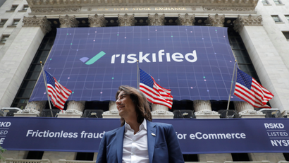Robinhood CEO Vlad Tenev stands outside the New York Stock Exchange after the company's IPO on July 29, 2021.