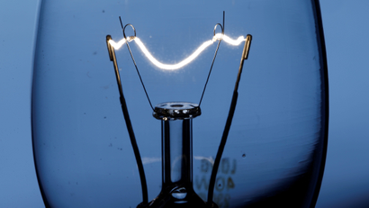 The filament of an incandescent light bulb