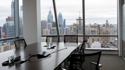 An empty office overlooks Philadelphia's skyline