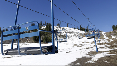 In this photo taken Wednesday, Jan. 28, 2015, a ski lift sits idle at the Donner Ski Ranch in Norden, Calif. Midway through California's ski season, the ranch is one of several ski resorts that have either suspended operations or cut back on the number of lifts operating due to the state's historic drought.