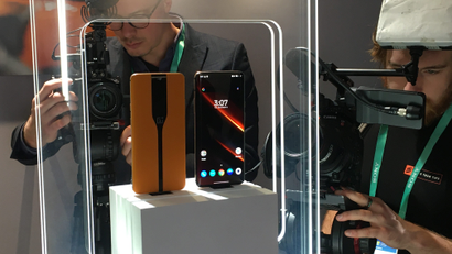 Photographers take pictures and video of the Concept One at CES 2020.