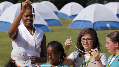 Michelle Obama and Girl Scouts camp on the South Lawn of the White House in 2015.