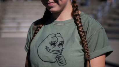 Sierra Rees, of Seattle, wears a Pepe the frog shirt hand-painted by her friend Jaeda Ferrel at a rally organized by the right-wing group Patriot Prayer in Vancouver, Washington, U.S. September 10, 2017.