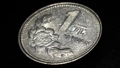 A Chinese one yuan coin is seen in this picture illustration taken in Beijing May 12, 2013. Investors convinced China's currency is once again a one-way bet upward should think again: signs of slowing economic growth could cut short the yuan's rally. Picture taken May 12. To match Analysis CHINA-YUAN/SPECULATION REUTERS/Petar Kujundzic