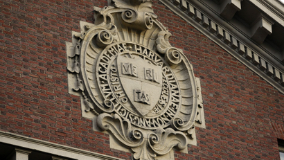 A seal hangs over a building at Harvard University in Cambridge, Massachusetts.