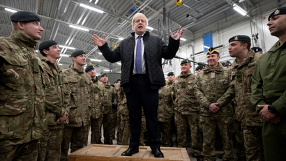 Prime minister Boris Johnson speaks during a visit to British troops stationed in Estonia