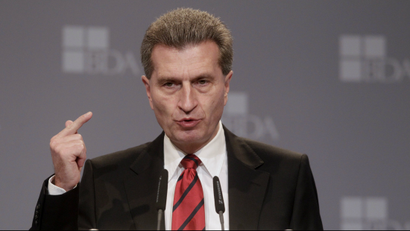 European Union Commissioner Guenther Oettinger makes a point during his speech at meeting of the Association of German Employers BDA in Berlin, November 23, 2010. REUTERS/Tobias Schwarz (GERMANY - Tags: POLITICS)