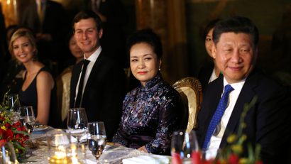 China's first lady Peng Liyuan looks at Chinese President Xi Jinping (R) as she sits next to Trump Senior Advisor Jared Kushner and Ivanka Trump (L), during a dinner at the start of a summit between U.S. President Donald Trump and Chinese President Xi at Trump's Mar-a-Lago estate in West Palm Beach, Florida, U.S. April 6, 2017.