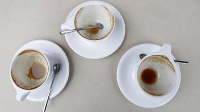 Three empty cups on a table are pictured at the Silver lake location of Intelligentsia Coffee and Tea in the Silver Lake area of Los Angeles October 19, 2010. REUTERS/Mario Anzuoni