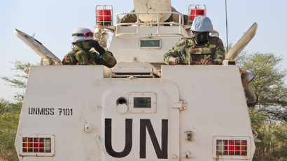 UN peacekeepers on a tank