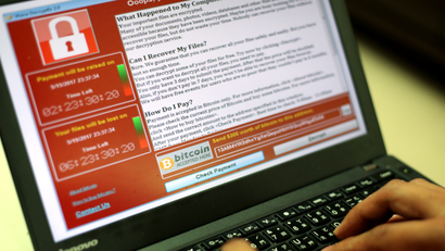 A programer shows a sample of a ransomware cyberattack on a laptop in Taipei, Taiwan, 13 May, 2017. According to news reports, a 'WannaCry' ransomware cyber attack hits thousands of computers in 99 countries encrypting files from affected computer units and demanding 300 US dollars through bitcoin to decrypt the files.