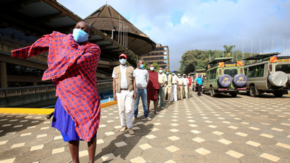Kenyan tour guides and travel operators queue to receive the AstraZeneca/Oxford vaccine under the COVAX scheme in Nairobi