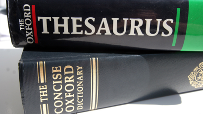 A generic picture of an English dictionary and a thesaurus.