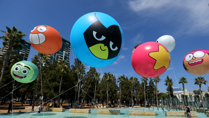 Images of cartoon network balloons with character's faces on them.