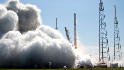 The Falcon 9 SpaceX rocket lifts off from launch complex 40 at the Cape Canaveral Air Force Station in Cape Canaveral, Fla., Tuesday, April 14, 2015. The rocket is transporting more than 4,300 pounds of supplies and payloads, including critical materials to directly support research at the International Space Station. (AP Photo/John Raoux)