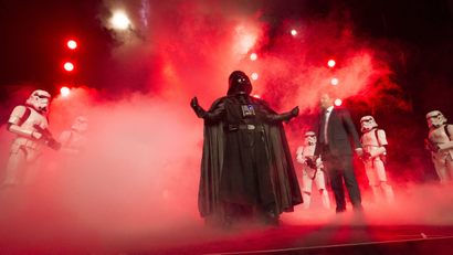 Disney Consumer Products Executive Vice President Josh Silverman is interrupted by "The Imperial March led by Darth Vader and 20 Stormtroopers as they take over the stage during a private Disney event at the Licensing Expo, Monday June 17, 2013