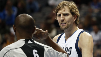 Dallas Mavericks player Dirk Nowitzki of Germany argues with the official (L) agianst the Los Angeles Lakers in the first half of their NBA basketball game at the American Airlines Center in Dallas, Texas, USA, 22 January 2017.