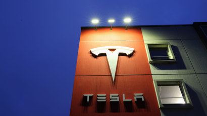 Logo of car manufacturer Tesla is seen at a branch office in Bern