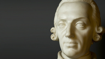 A sculptured bust of Adam Smith's head.