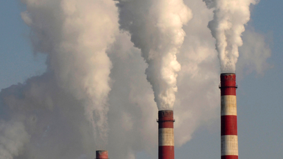 Smoke rises from chimneys of a power plant in Changzhi, Shanxi province November 17, 2009.