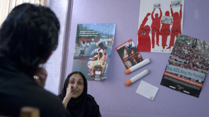 An Iranian social worker speaks with a reforming drug addict at the Aftab (Sunshine) Society Clinic in Tehran May 20, 2007.