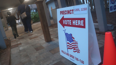 Voters head to a polling station in Tallahassee, Florida, U.S.