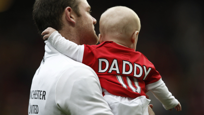 Wayne Rooney with son