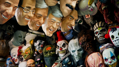 masks representing Mexican presidential candidates Jose Antonio Meade, of the Institutional Revolutionary Party (PRI), Ricardo Anaya, center, of the left-right coalition Forward for Mexico, and Andres Manuel Lopez Obrador of the Morena party are for sale at a local market in Mexico City,