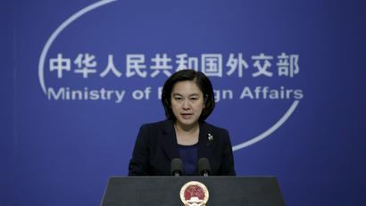 Hua Chunying, spokeswoman of China's Foreign Ministry, speaks at a regular news conference, in Beijing