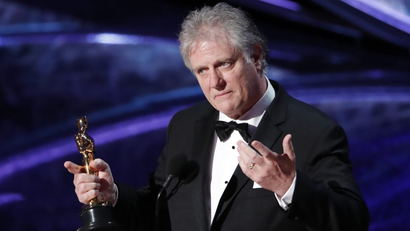 Donald Sylvester holds Oscar for sound editing